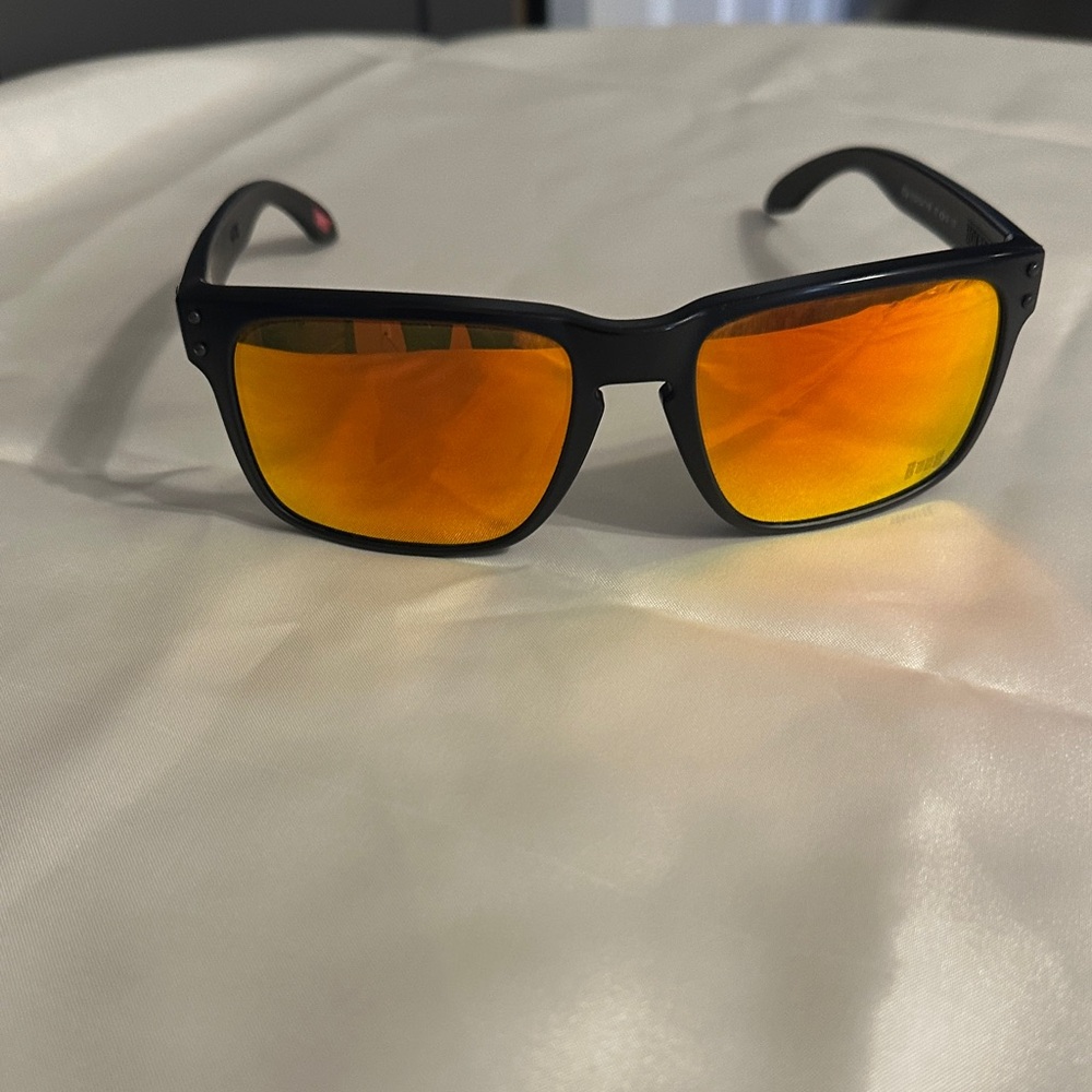 Oakley 009102 Tampa Bay Buccaneers Black Sunglasses with Orange Lenses